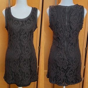 Dark gray stretchy lace dress with lined layer. Size Medium